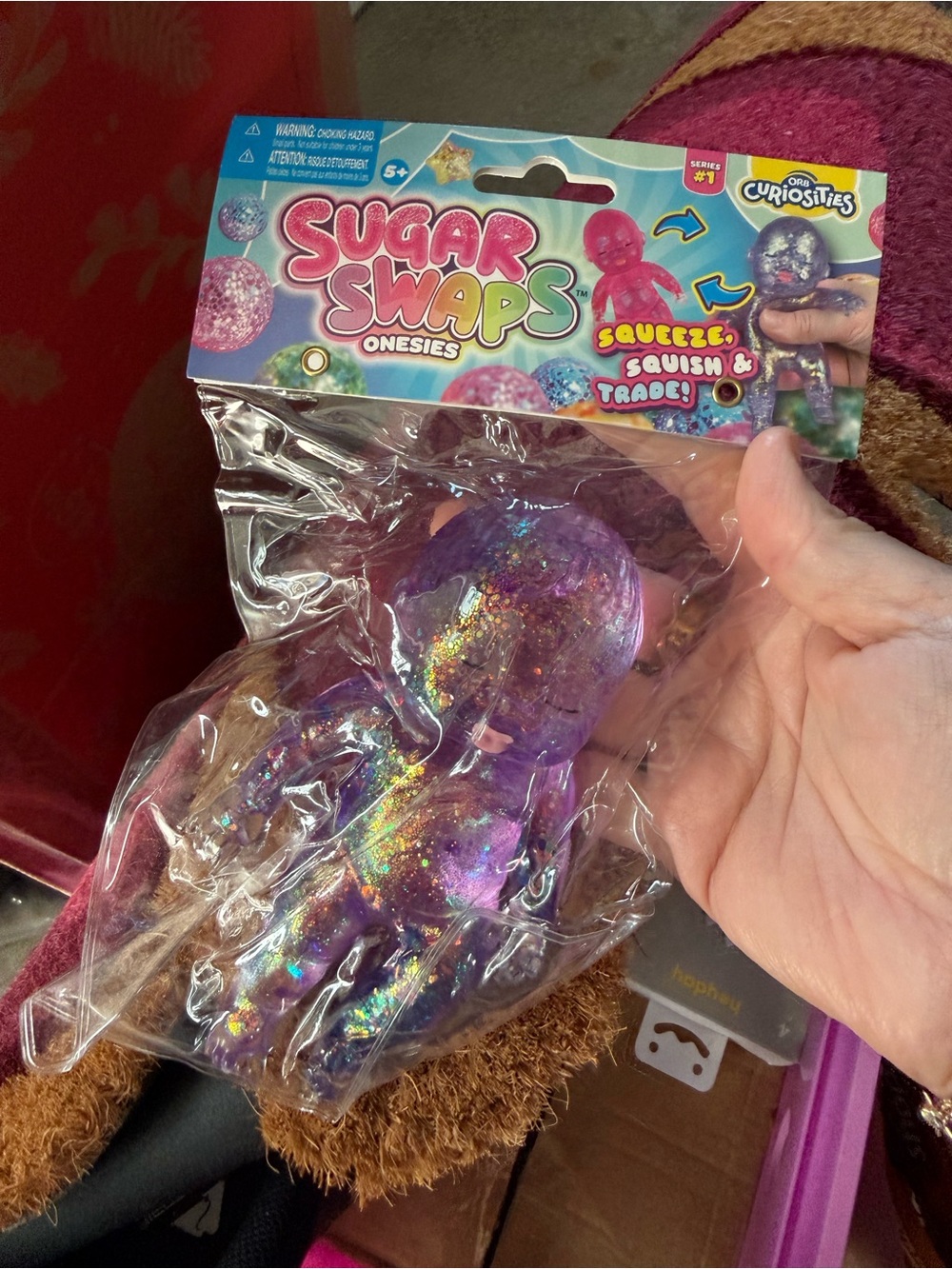 Sugar Swaps Onesies Purple Glitter Squishy Toy by Crazy Aaron's ()
